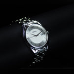 Kép betöltése a Galériamegjelenítőbe, Luxury watch (121.10.023.10): watch face angled view left zoomed out
