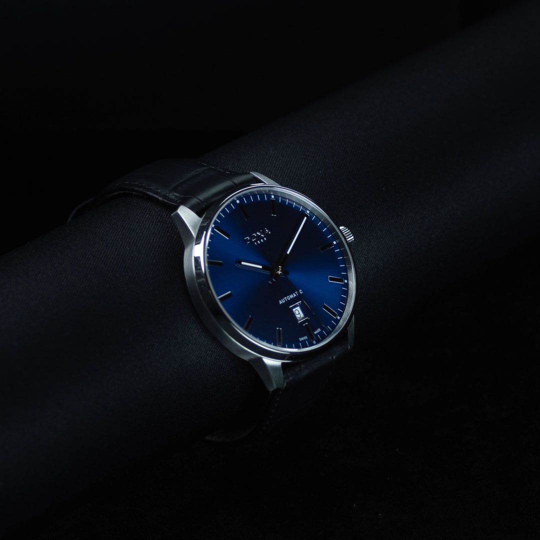 Luxury watch (195.10.201.01): watch face angled view left zoomed out