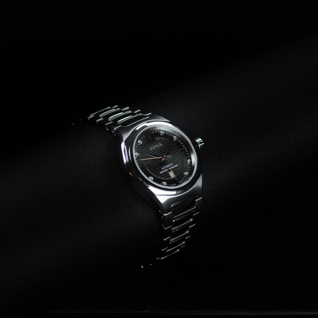 Luxury watch (D190SGY): watch face angled view left zoomed out