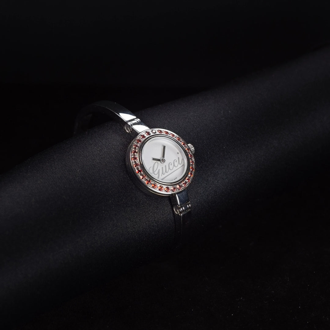 Luxury watch (YA105534): watch face angled view left zoomed out