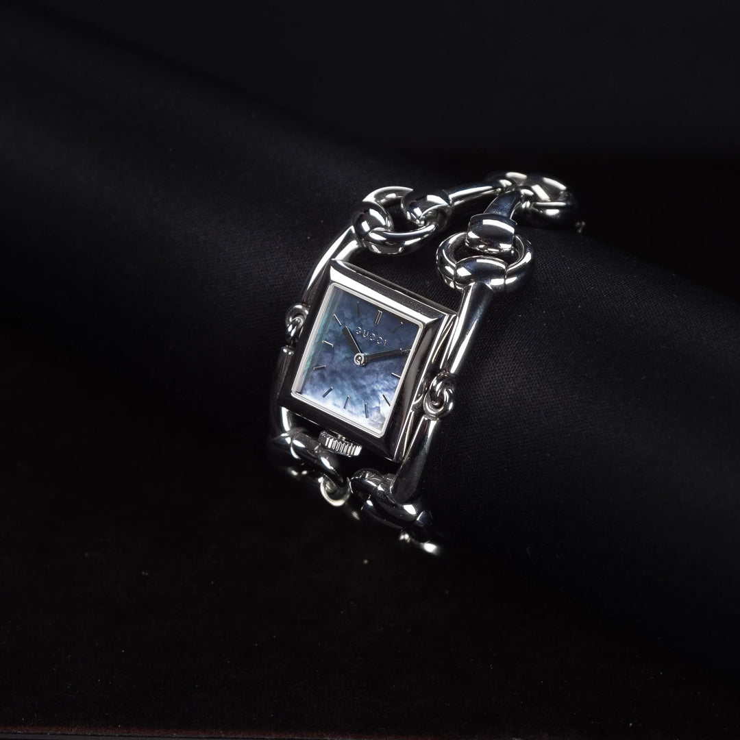 Luxury watch (YA116302): watch face angled view right zoomed out