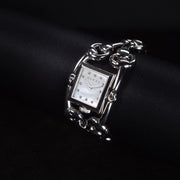 Luxury watch (YA116309): watch face angled view right zoomed out