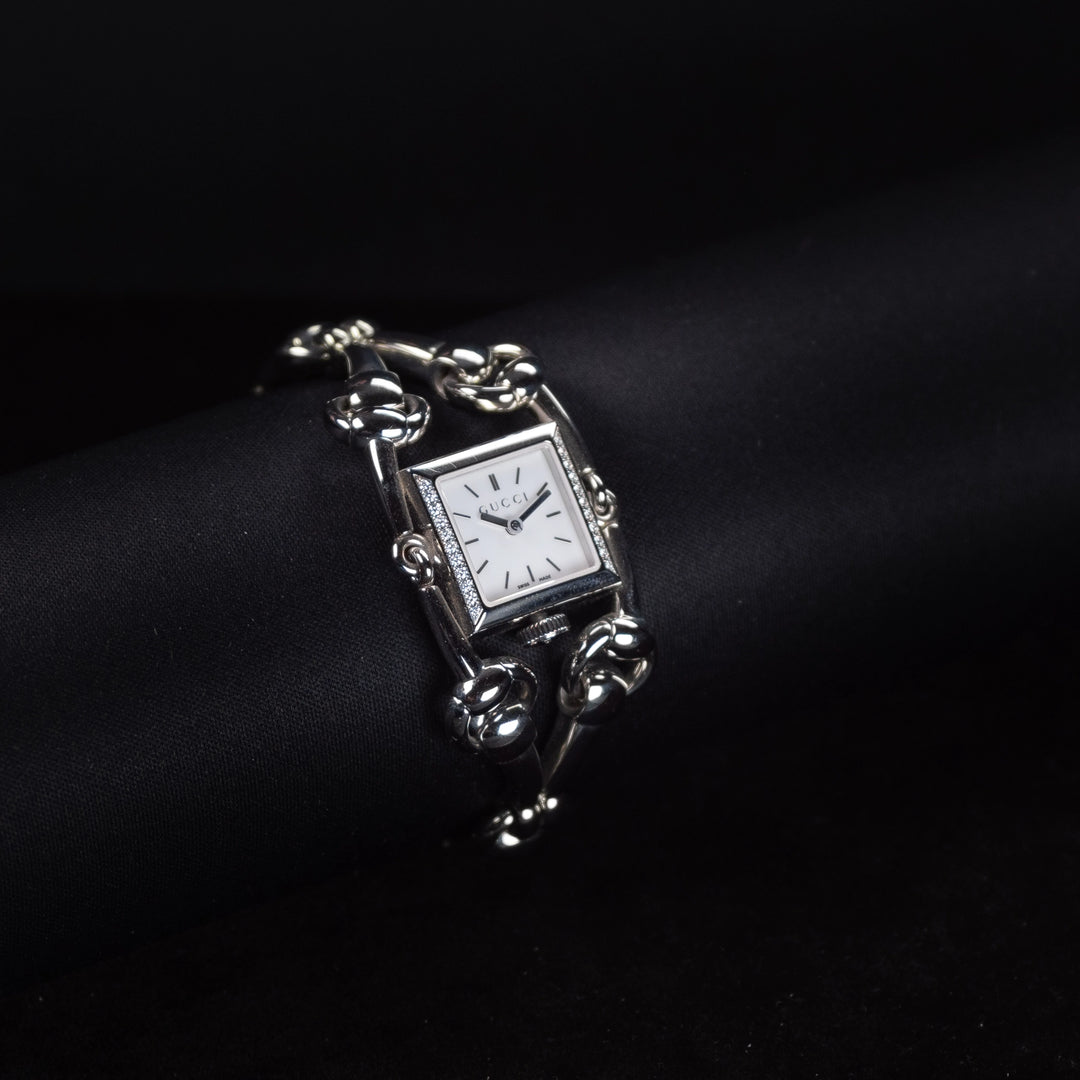 Luxury watch (YA116505): watch face angled view left zoomed out