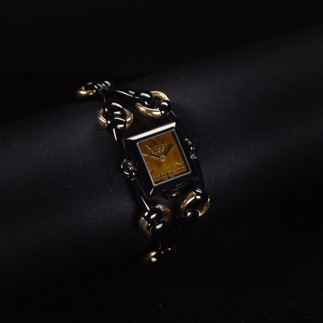 Luxury watch (YA116518): watch face angled view left zoomed out