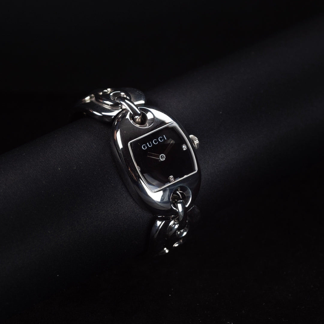 Luxury watch (YA121303): watch face angled view left zoomed out