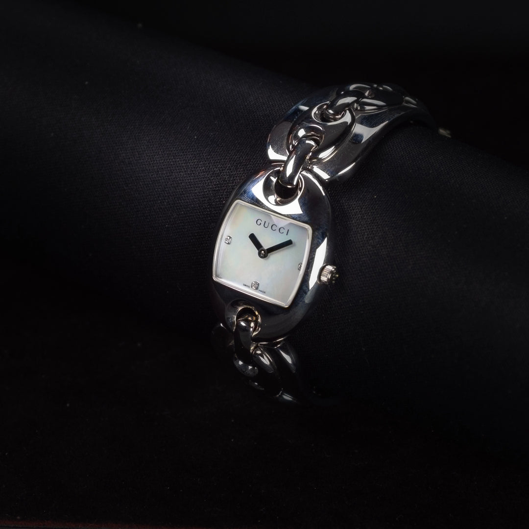 Luxury watch (YA121504): watch face angled view right zoomed out