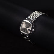 Luxury watch (YA125411): watch face angled view right zoomed out