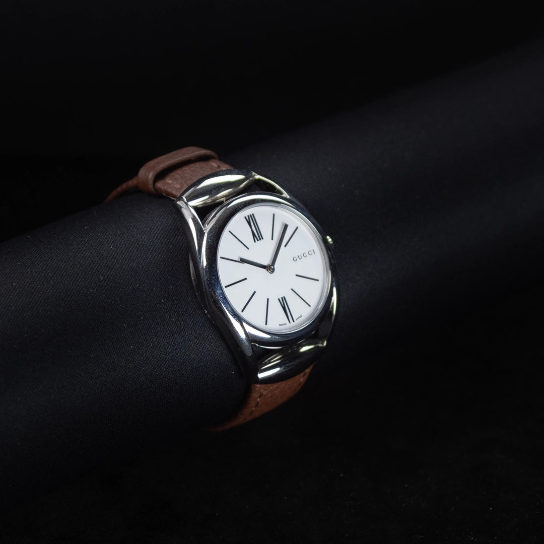Luxury watch (YA140401): watch face angled view left zoomed out